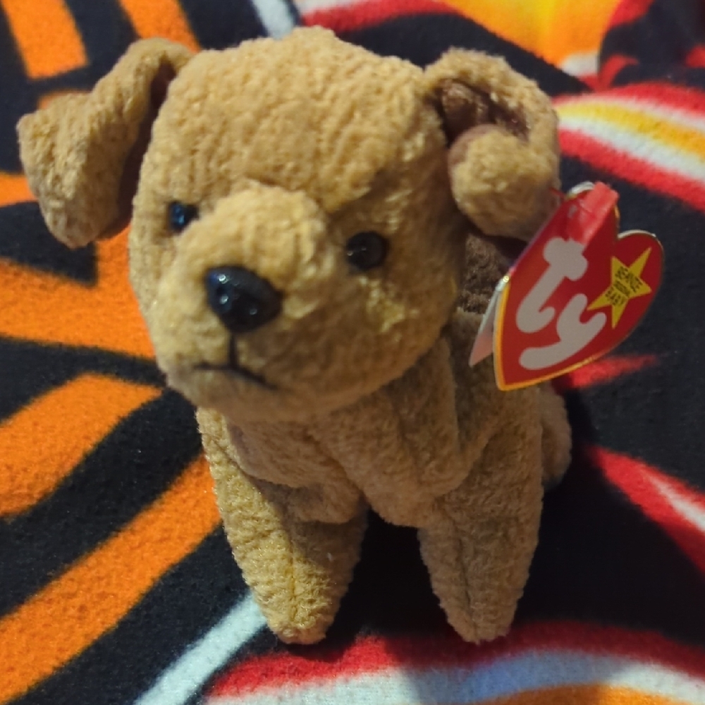 Golden Brown Plush Dog Toy with Floppy Ears and Cute Expression